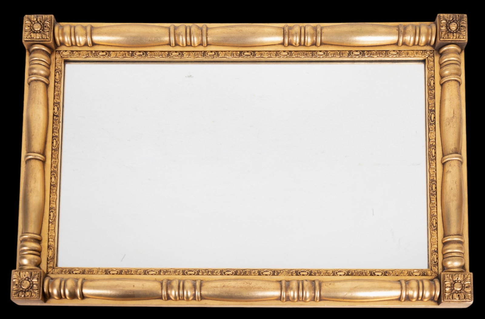 Federal Style Gilt Pier Mirror w/ Intaglio Cut: A gilt Federal style vintage pier mirror with Intaglio tag on back. Measures approx. 35.5" H x 23.5" W.
