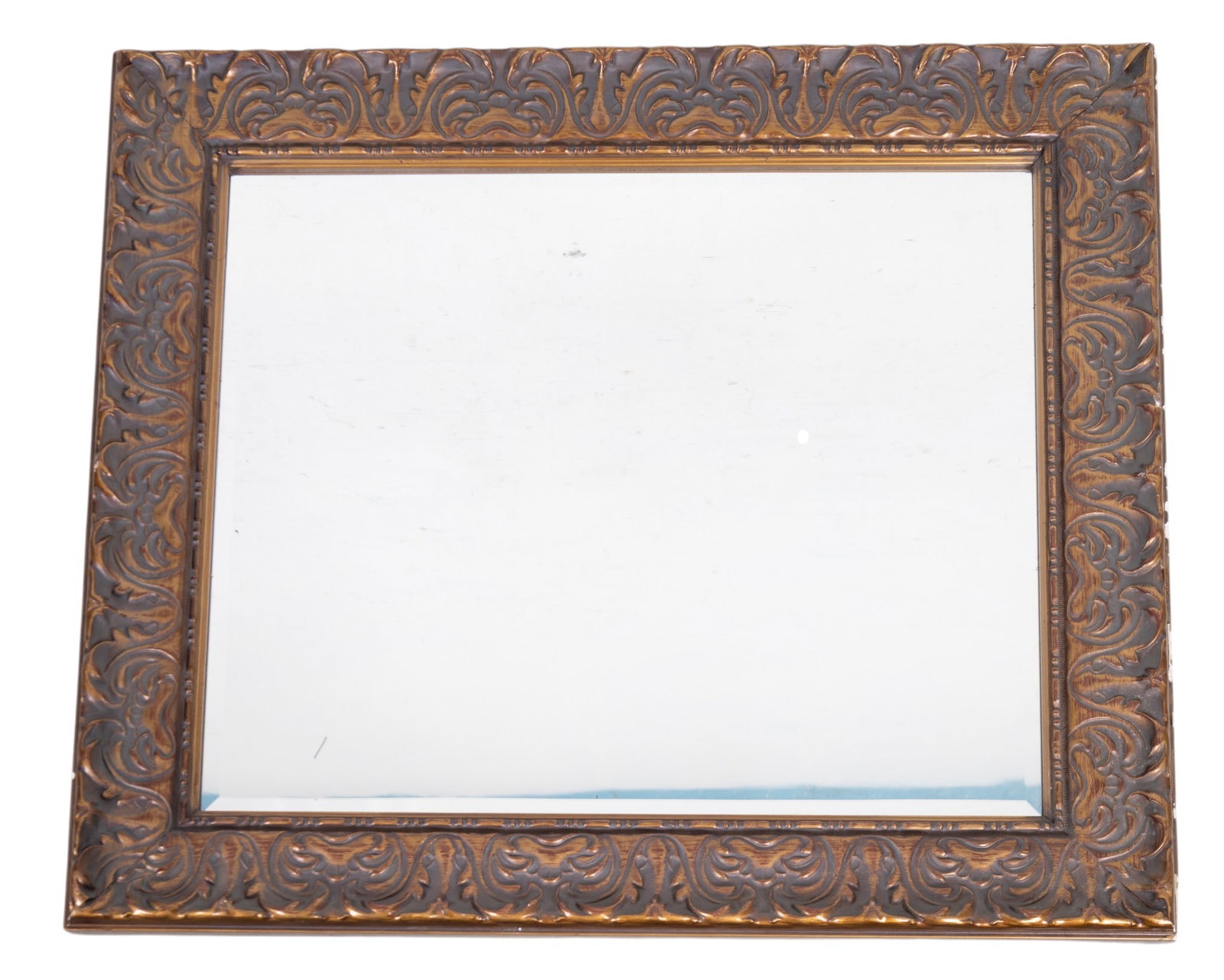 Decorative Framed Beveled Glass Mirror: Rectangular wall mirror with beveled glass plate set in an ornate molded frame featuring scrolling foliate decoration and bronze-tone finish. Measures approx. 30" W x 26" H.