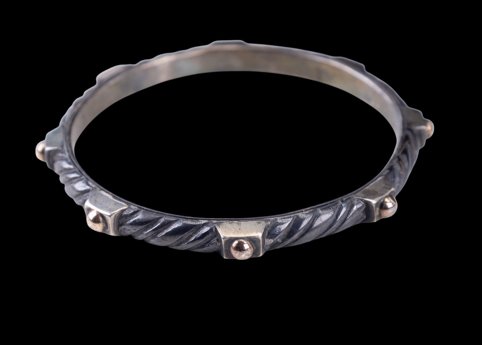 Early William Spratling Bangle Bracelet: Signed in the "WS" mark of early William Spratling; silver unmarked bangle with gold detail