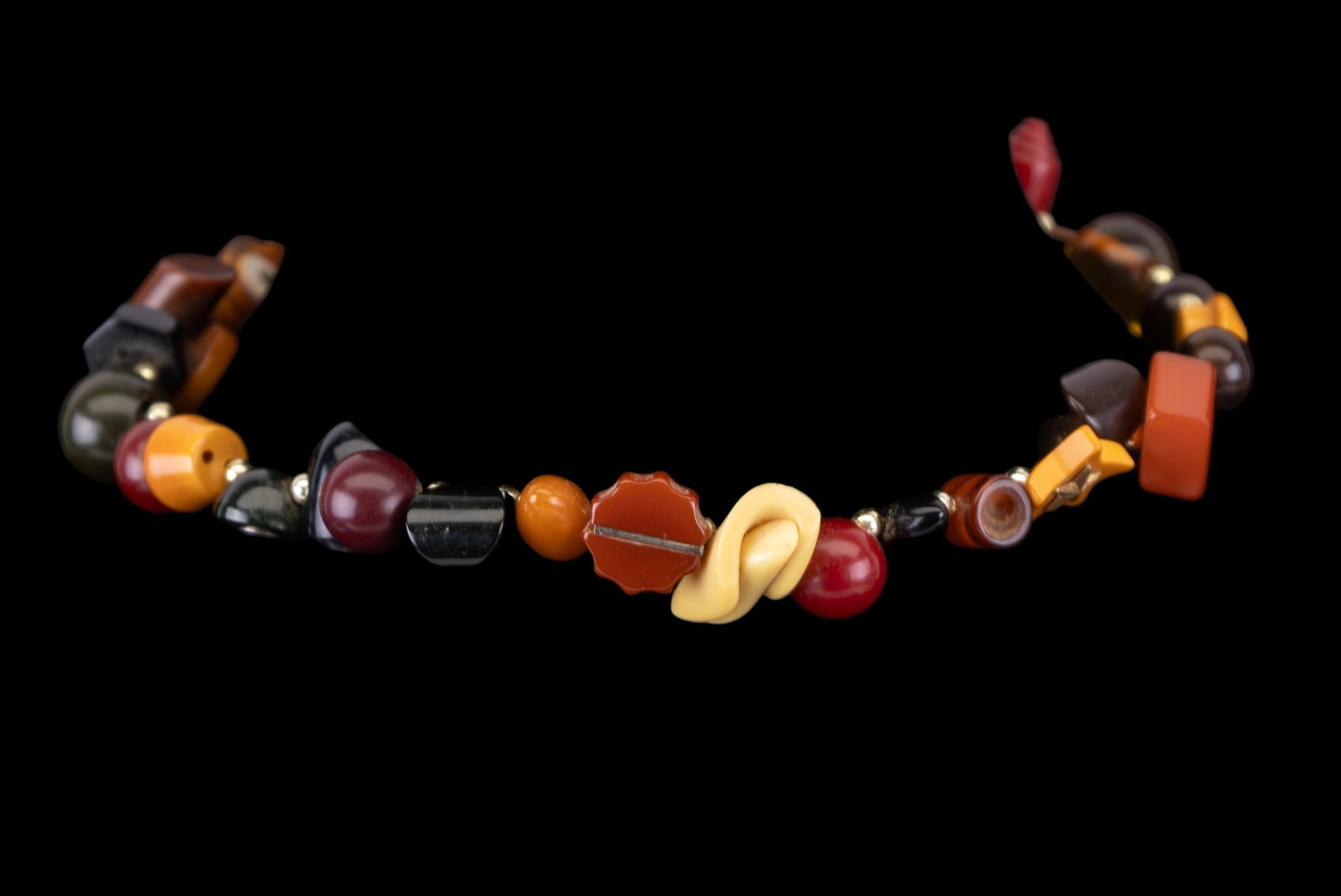 Bakelite Necklace: A "button" necklace or collar made primarily of vintage Bakelite buttons.