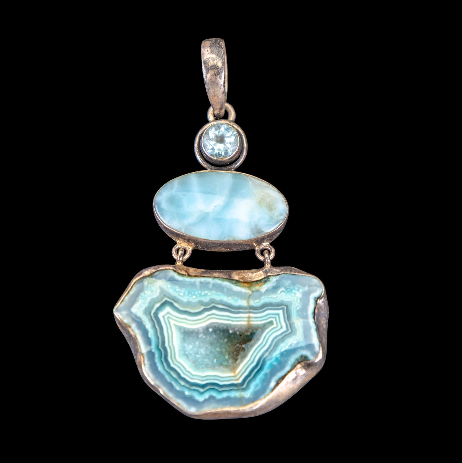 Sterling Silver Geode Pendant: Blue geode stone pendant set in sterling silver.