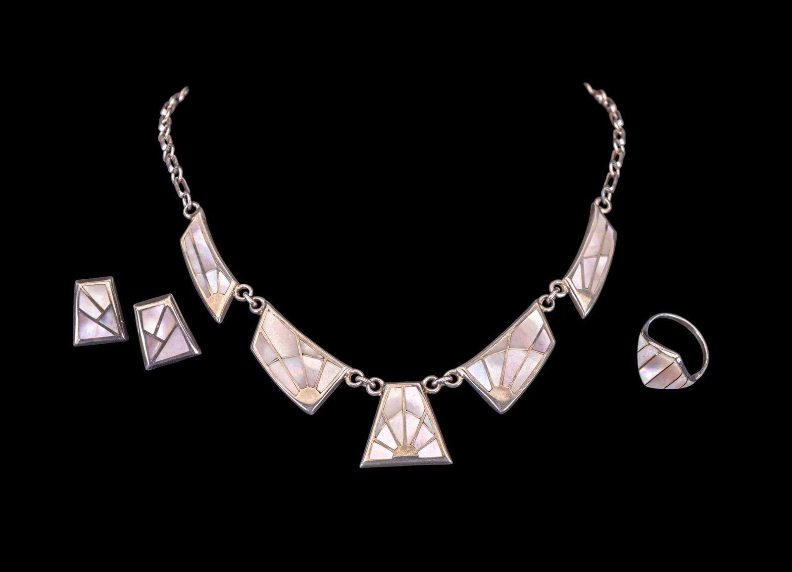 Native Mother of Pearl Set: Signed Teme and Sterling; Includes a necklace, pierced earrings and a matching ring.
