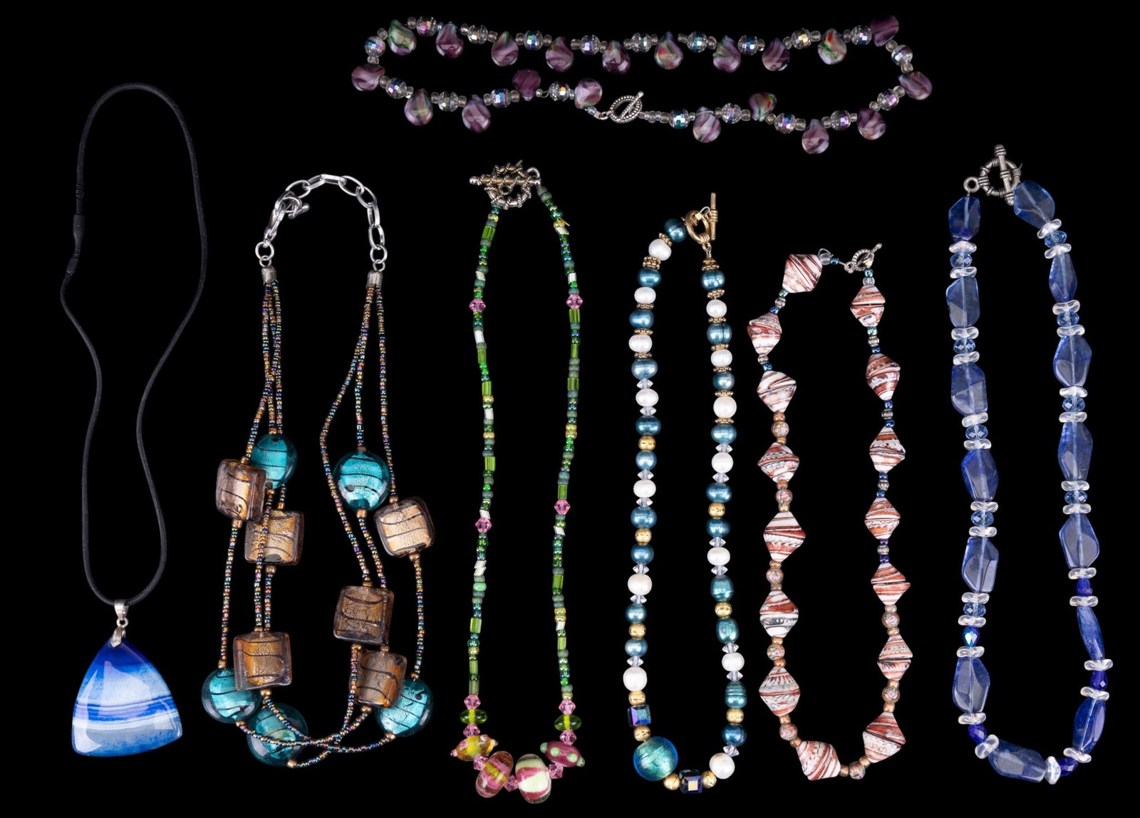 Colorful Glass Jewelry: Several artisan, handmade glass necklaces and blue geode style pendant