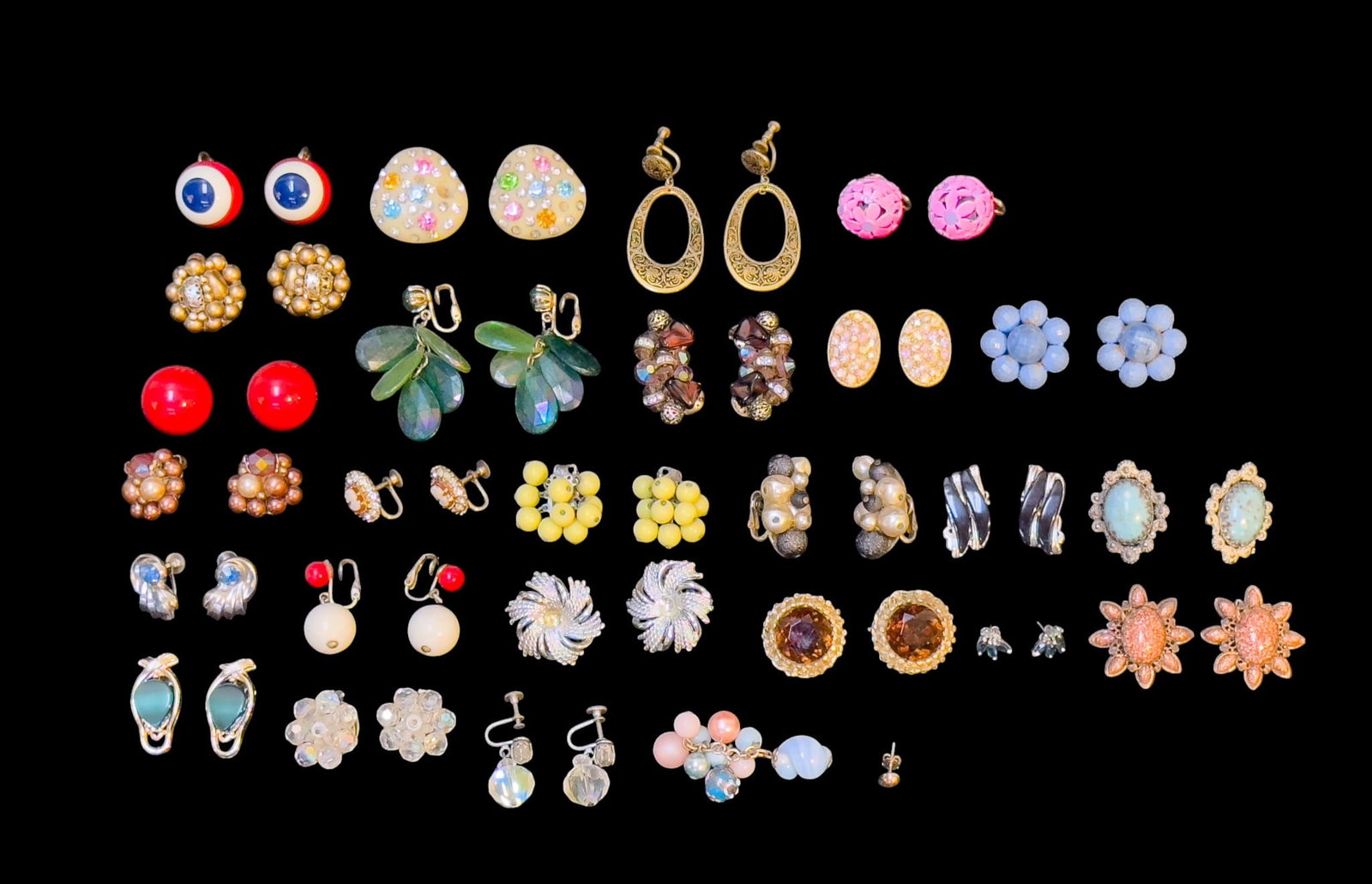 Large Collection of Vintage Earrings: Collection of mostly vintage clip earrings, copper, rhinestone, lucite and rhinestone, pink mod and more