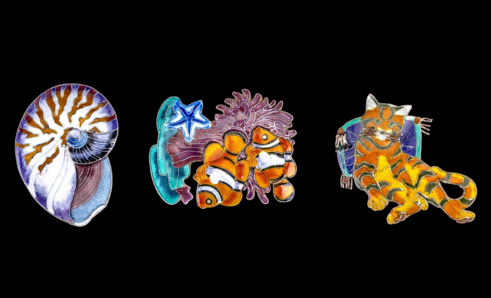 Vintage Enamel Sterling Pins: Includes a silver and enamel nautilus shell pin, a fish pin and a lounging orange cat pin.
