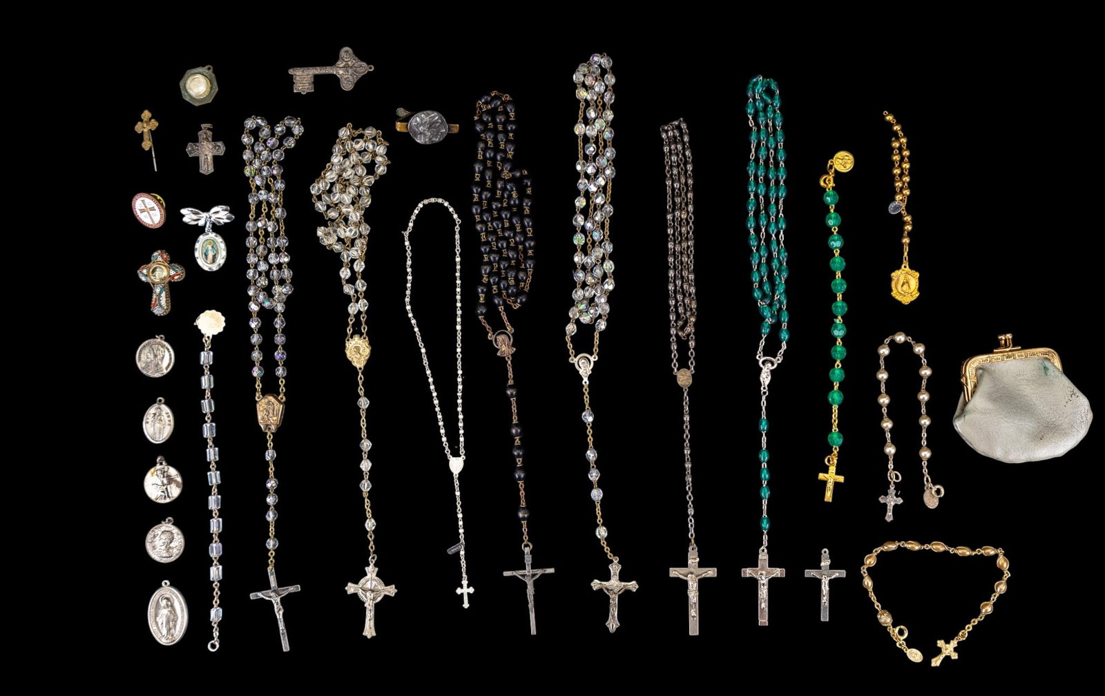 Vintage Rosaries and Prayer Medallions: A collection of vintage Rosaries, Rosary bracelets, religious lapel pins, and prayer medallions.