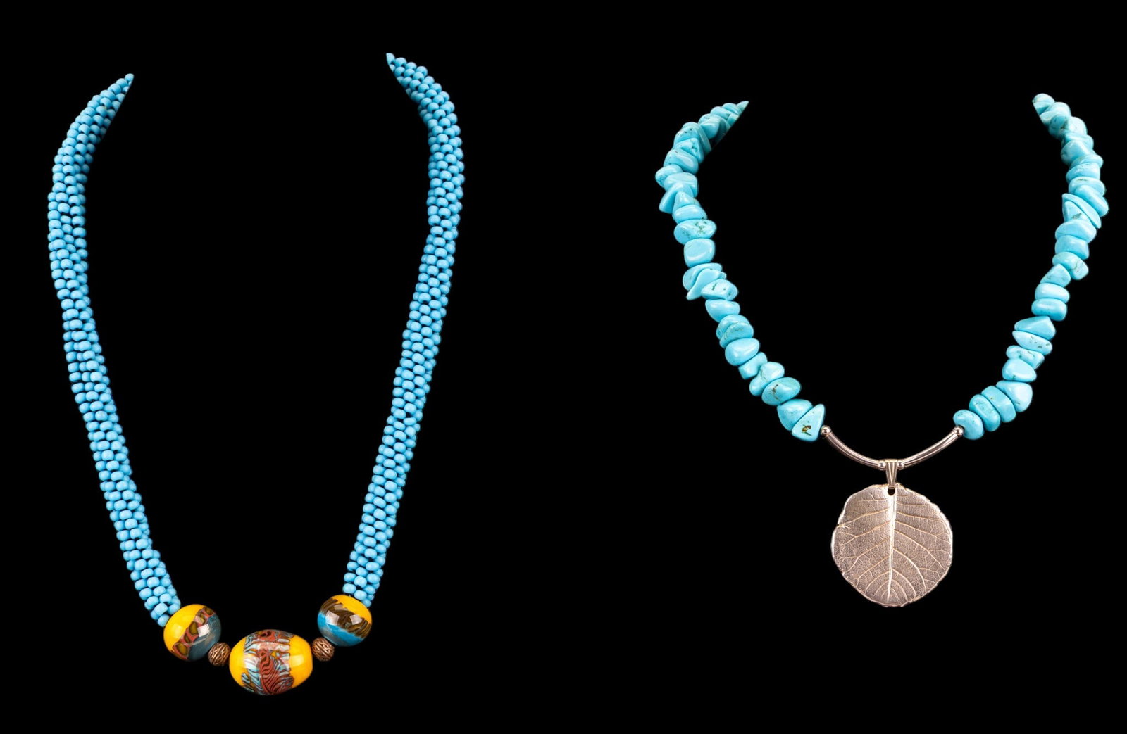 Sterling & Turquoise, Art Glass Bead Necklaces: Artisan crafted necklaces featuring a truqiouse nugget necklace featuring a sterling toggle clasp and sterling leaf impression pendant, and a hand strung turquoise colored glass bead necklace with art
