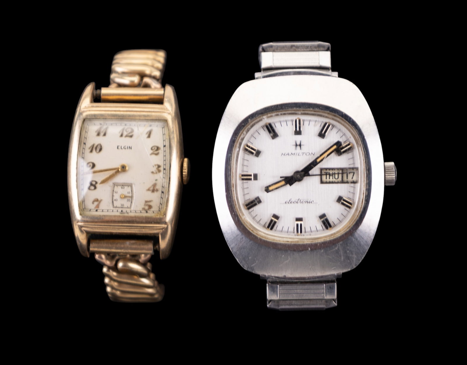 Vintage Elgin and Hamilton Wrist Watches: A vintage gold tone Elgin 15 jewel wrist watch case #341598 movement ##X611368 with personalized base metal backing, and a vintage stainless steel Hamilton wrist watch #702002-3.