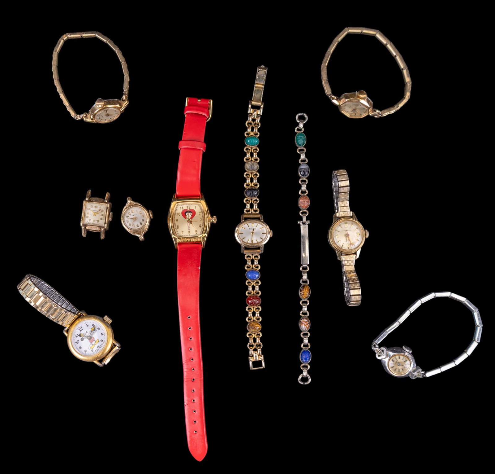 Vintage Ladies Wrist Watches: A collection of vintage ladies wrist watches including Timex and Caravelle, Betty Boop novelty watch, a Bradley Mickey Mouse watch #A49693, A Hampden 17 jewel movement in a 10K GF Lapwell bezel/case, 