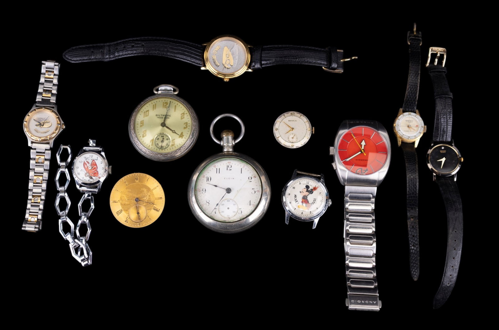Seiko, Elgin, and Other Watches: A Seiko wrist watch on a leather band #131676, a loose Benrus 17 jewel wrist watch movement, two Harley Davidson wrist watch by Montreaux and Jostens, a Biltmore pocket watch, an Elgin 17 jewel moveme