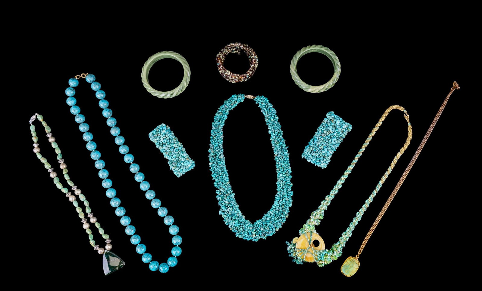 Turquoise and Costume Jewelry: Turquoise and costume jewelry featuring a 21" green turquoise bead necklace with a 1 1/2" polished agate pendant, 2 blue turquoise stretch bracelets, a blue howlite bib necklace, a 30" vintage plastic