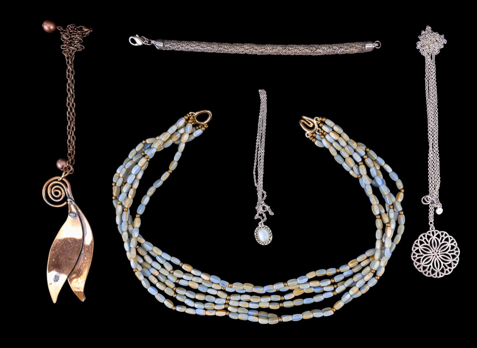 Quality Costume Jewelry: Quality costume jewelry featuring a 6 strand 18" bib necklace (or twisted for a forsade style necklace) with opalite or moonglow glass beads, a couble leaf copper necklace, a 7 1/2" five silver tone s