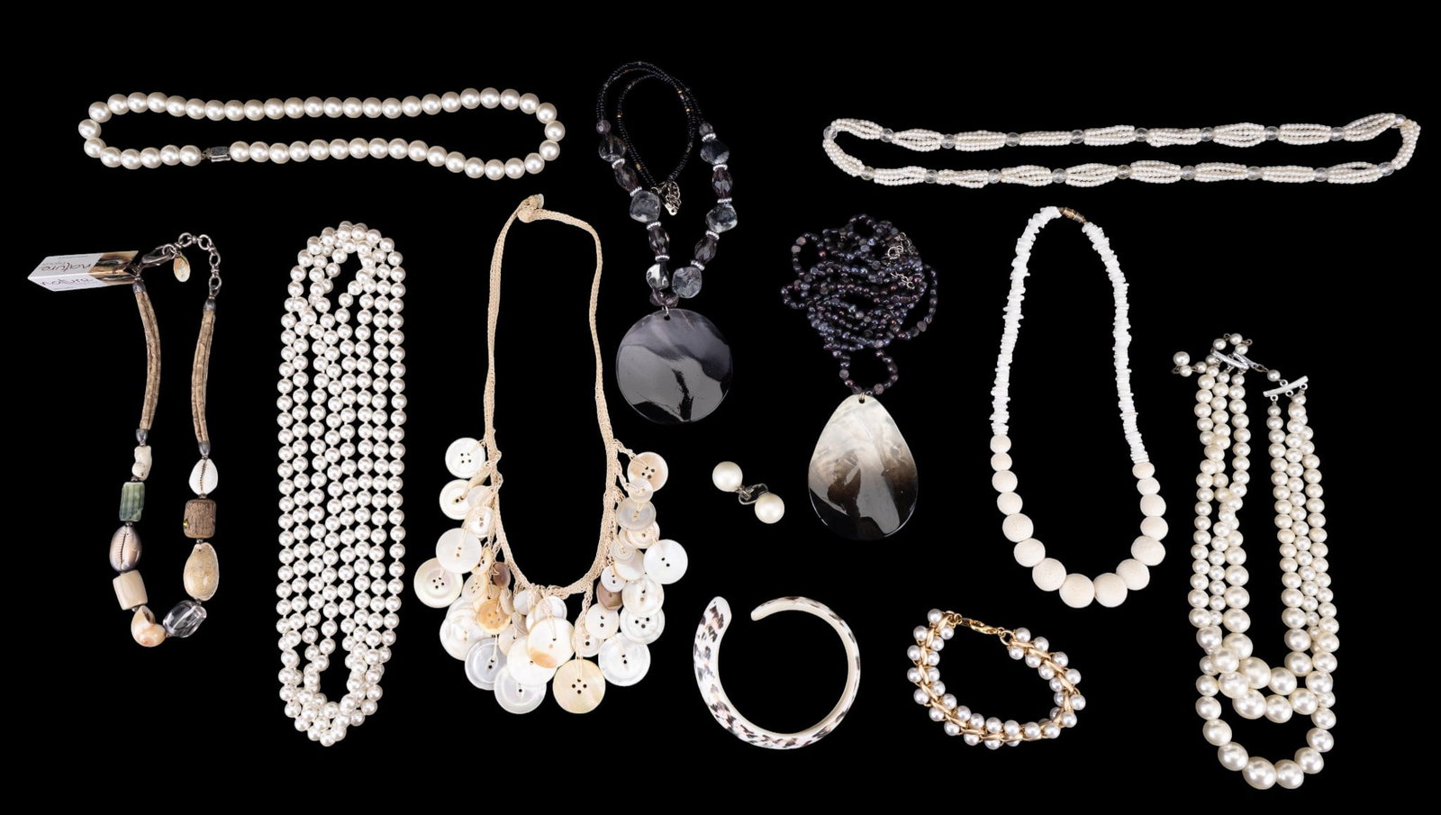 Shell &Faux Pearl Jewelry: Statement shell pendant necklaces, a seashell cuff bracelet from a single large shell, a Nature Bijoux necklace, a white shell and coral bead necklace, a cotton crocheted necklace with antique mother 