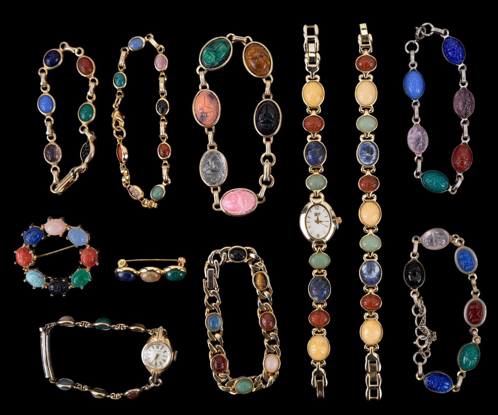 Scarab Jewelry/Watch Collection: Scarab watches, pins, and bracelets featuring a vintage Beleforte 17 jewels watch with semi-precious stone scarabs 1/20 10 KGF USA Jacoby-Bender bracelet band (1950's-1960's), a Gruen II scarab bracel