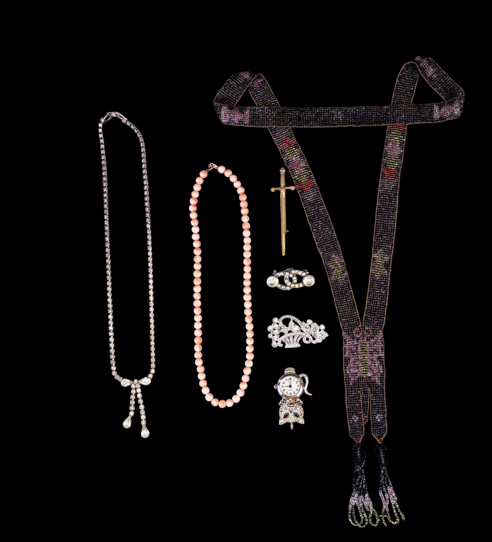Antique and Vintage Jewelry w/ Cat Watch: A collection of antique and vintage jewelry including a beaded Sautoir Flapper necklace, spherical polished coral bead necklace with 14K GF clasp, a vintage rhinestone necklace, rhinestone brooches, a