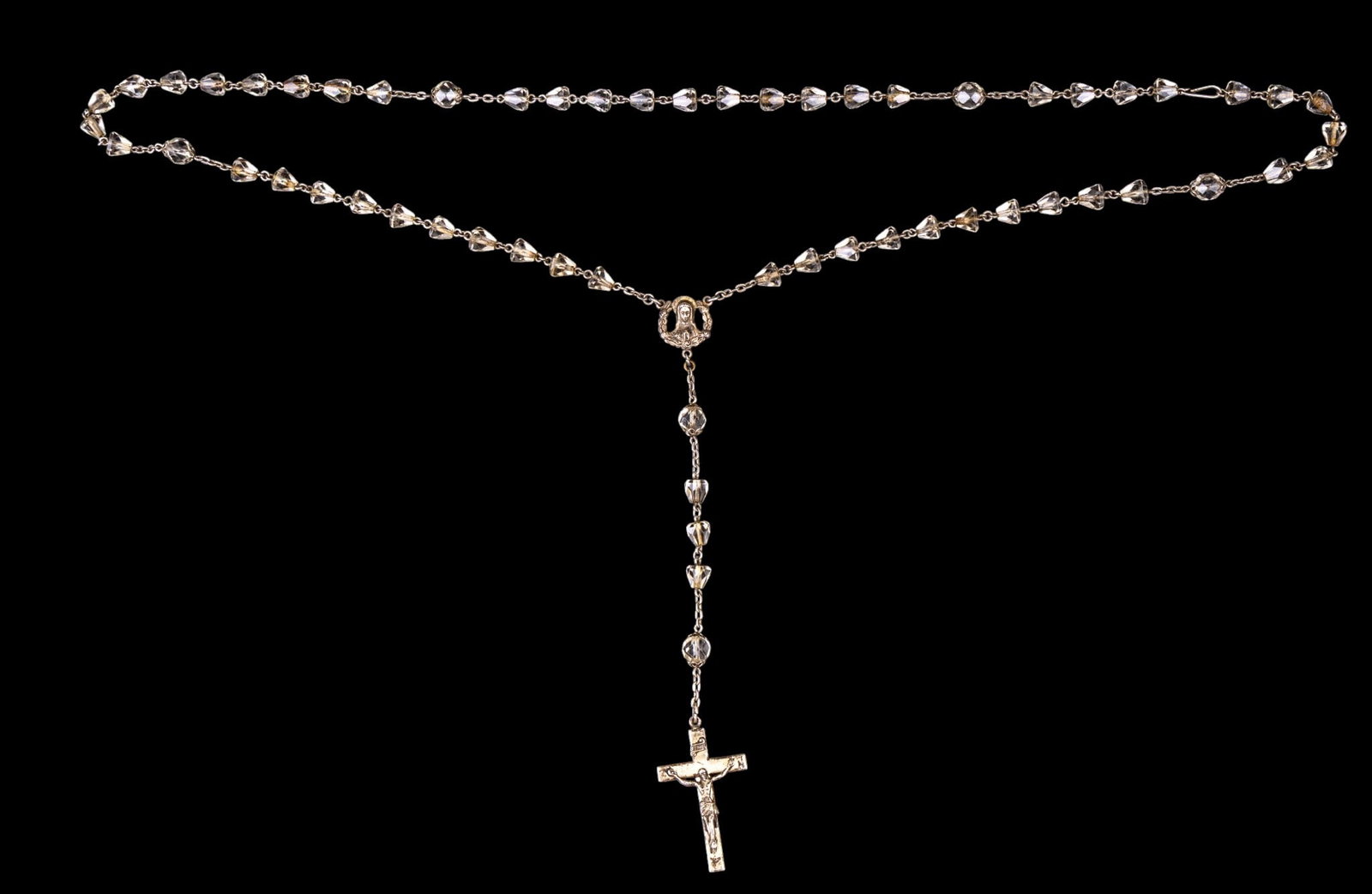Sterling and Crystal Rosary: A sterling silver and facet cut crystal bead Rosary, measures approx. 23" end to end.