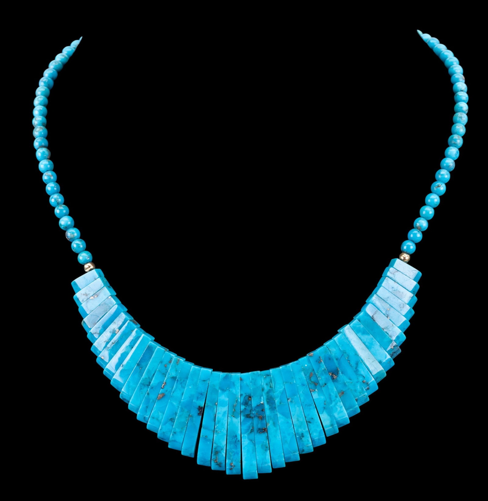 Turquoise Bib Necklace, 14K Clasp: A blue turquoise polished stone bib necklace featuring a 14K gold fish hook clasp, measures approx. 6.5" on the drop.