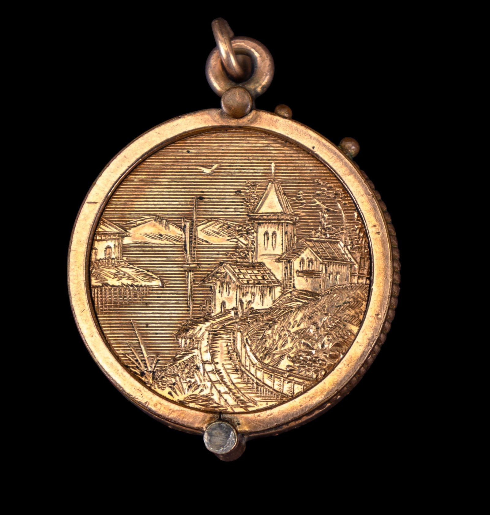 Victorian Gold Filled Penny Case: A finely etched Victorian gold filled penny case depicting a sailboat on one side and a village on the reverse.