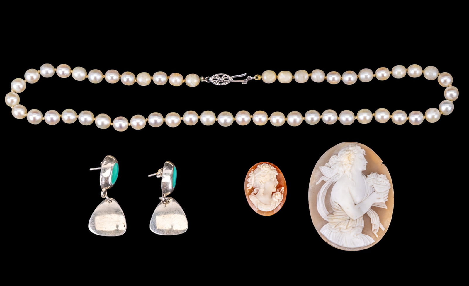 14K Gold Clasp Pearl Necklace, Shell Cameos: Grouping includes a 14K white gold clasp pearl necklace measuring approx. 16" long, sterling silver and blue enamel drop earrings, a 2" h x 1.5" w shell cameo, and a 1" x 0.5" shell cameo.