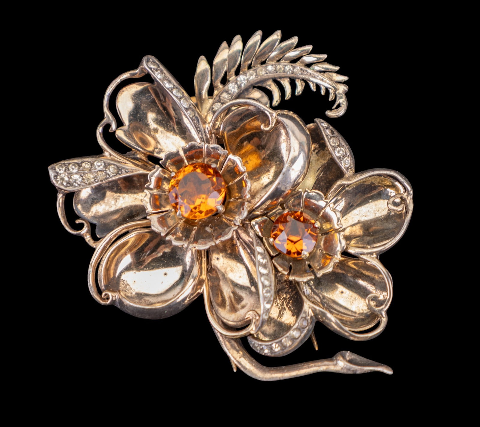 Early R. Derosa Sterling Silver Brooch: An early signed R. Derosa sterling silver brooch / fur clip with two brown faceted stones measuring approx. 3" x 2.5". Item in good condition.