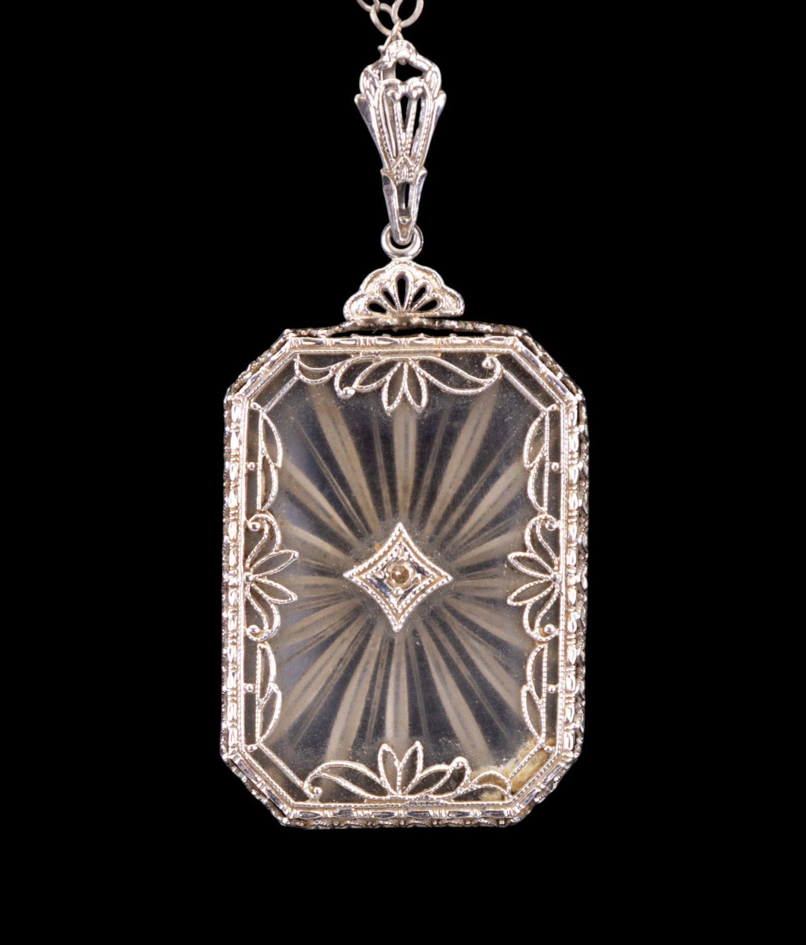 14K White Gold Victorian Necklace w/ Pendant: A Victorian era 14K white gold intricate necklace measuring approx. 15" in length along with a 1.5" x 0.5" white gold glass pendant. Necklace has spring clasp in good condition.