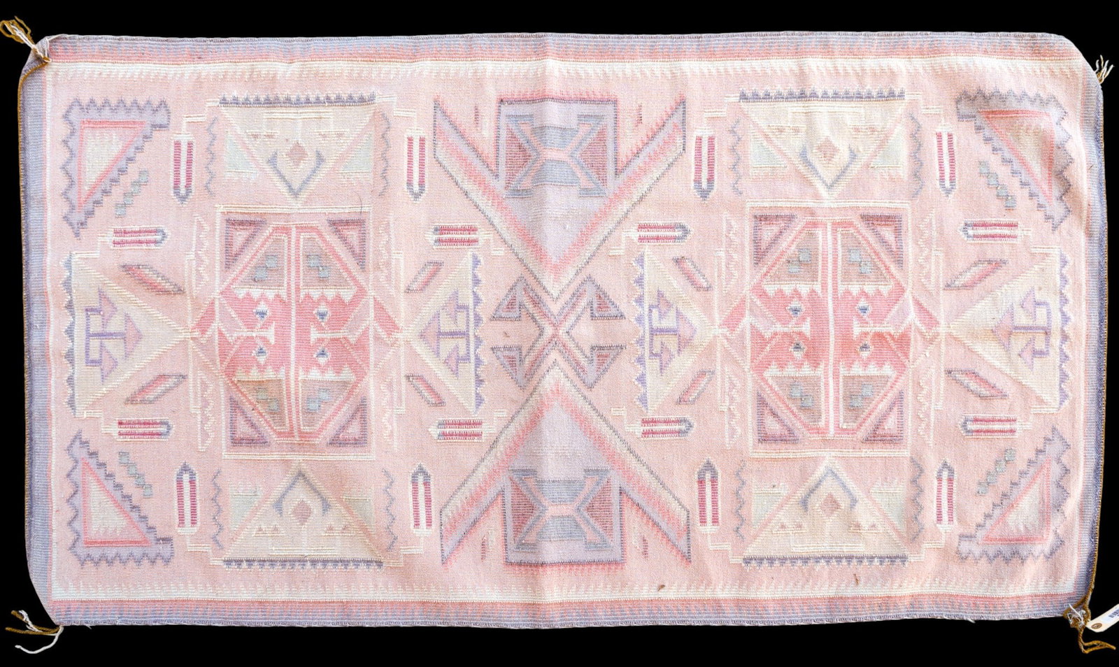 Wool Hand Woven Turkish Oushak Rug: A hand woven Turkish Oushak wool rug featuring muted pink and purple geometric patterns, measures approx. 6'1" W x 6'6" L.