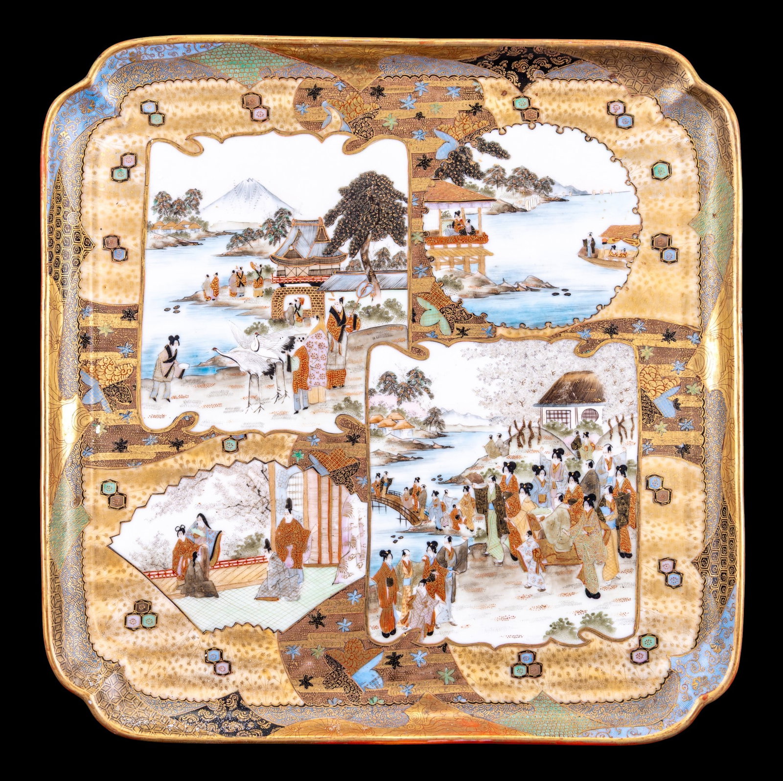 Japanese Kutani Porcelain Square Serving Tray: Japanese Kutani porcelain square serving tray, decorated in gilt and enamel with figural landscape reserves depicting village scenes and waterside landscapes. Measures approx. 14 1/2" Square. Undersid