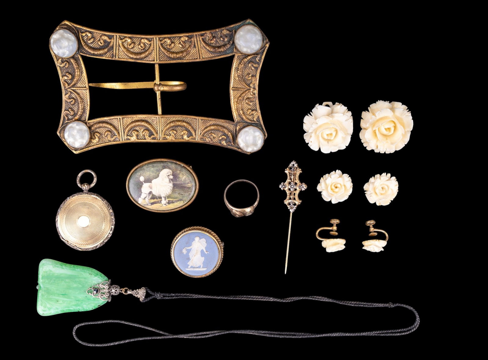 Vintage and Antique Jewelry: Snake ring, carved rose jewelry, Victorian locket and more.