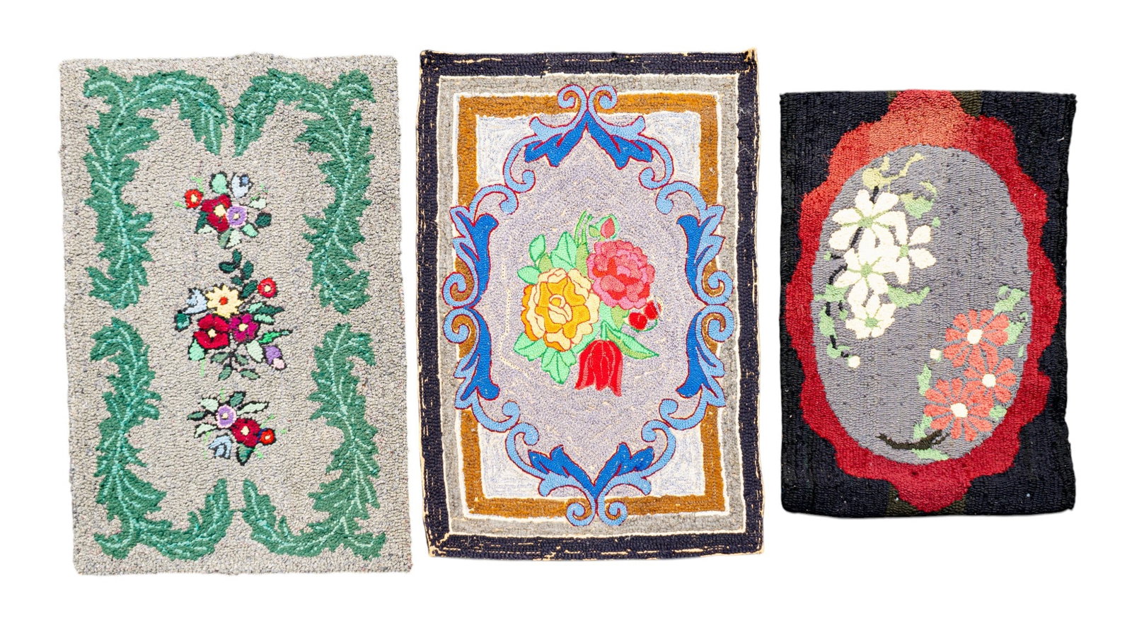 Early American Hook Rugs (3): A collection of three early American hook rugs one with a grey and green floral motif and one with bright colored floral motif with black border, both measure 2' 3" W x 3' 4", and a the third features