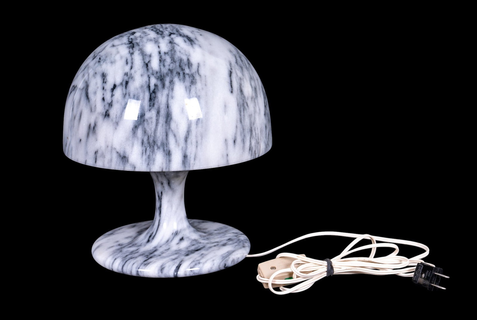 Mid-Century Marble Mushroom Table Lamp: Mid-20th century mushroom-form table lamp featuring a polished white and gray veined marble dome shade with matching marble pedestal base. Single standard socket with inline cord switch. Measures appr