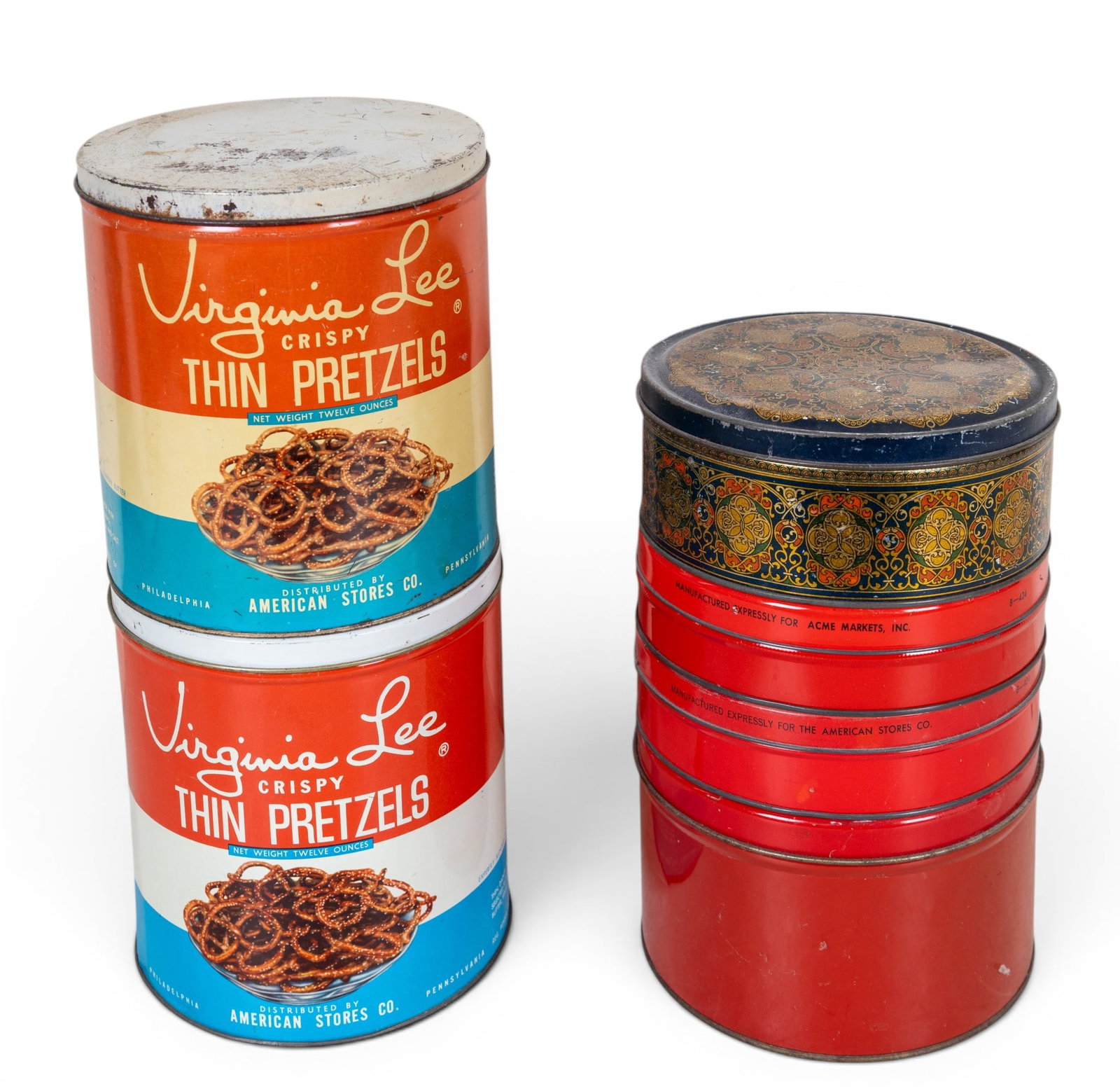 6 Vintage Candy and Pretzel Tins: 6 vintage metal tins featuring designs from Virginia Lee, including 'Crispy Thin Pretzels' and 'Fancy Assorted Hard Candies.' Each tin shows vibrant graphics with advertising text and branding. Wear a