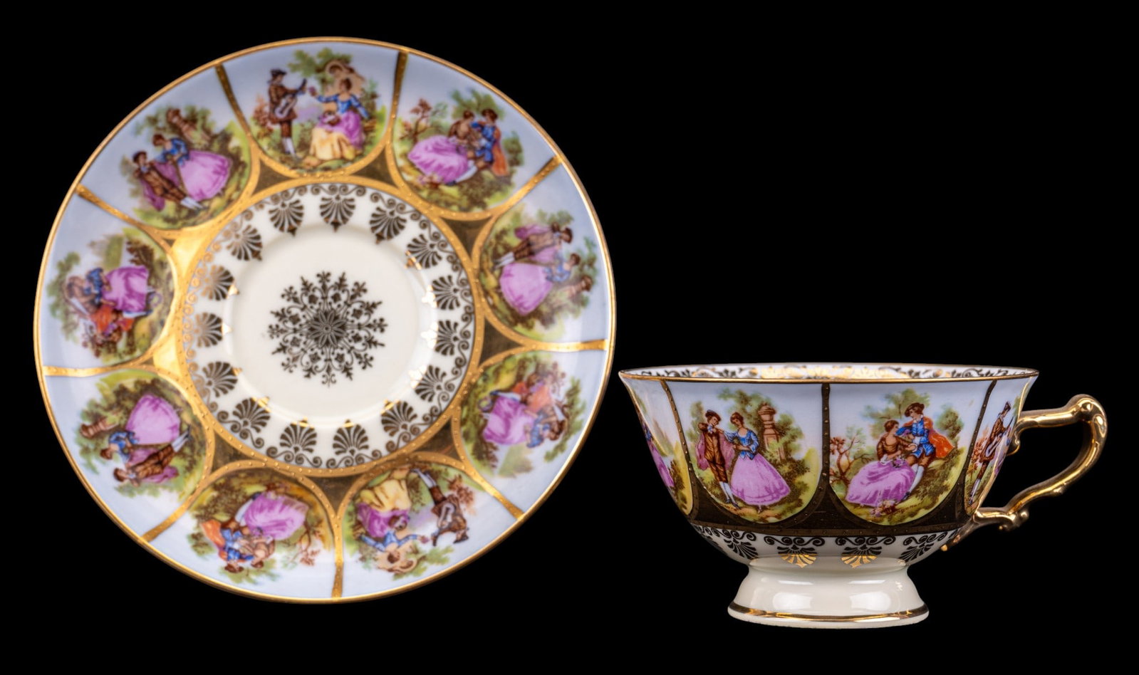 West German "Love Story" Teacup & Saucer: Decorative porcelain teacup and matching saucer featuring hand-painted courting scenes with gilt decoration and gilt-washed interior. Marked "Made in Western Germany" and "Love Story" Handpainted" to