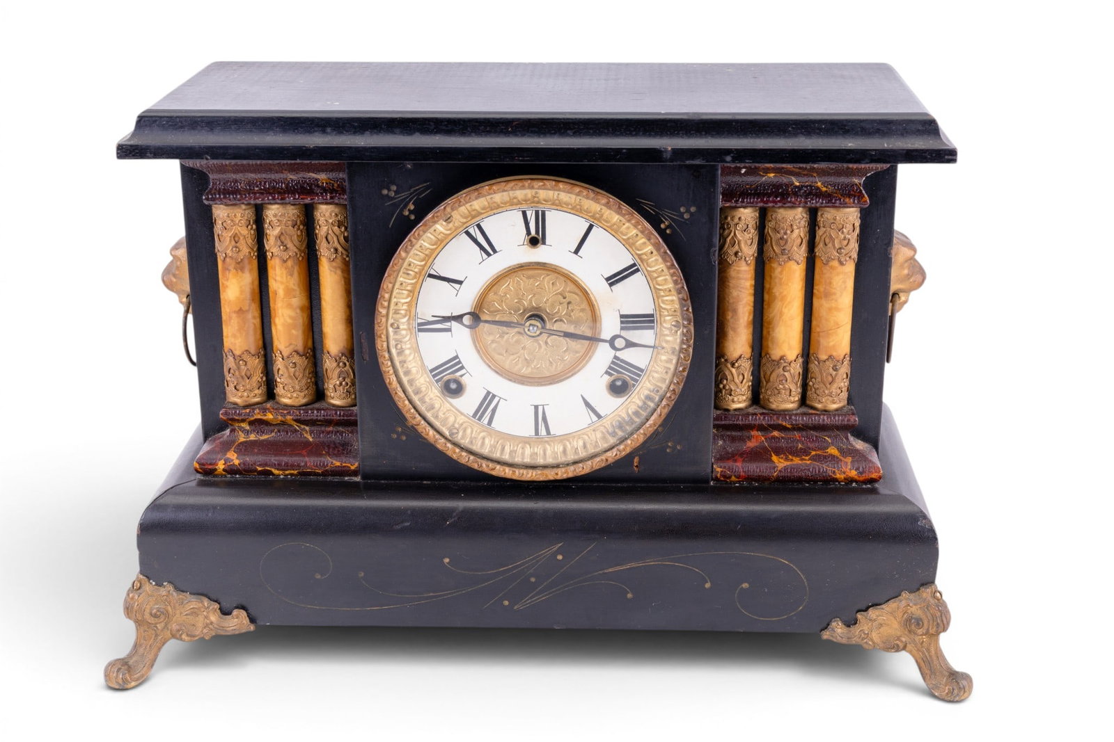 Antique Gilbert Time & Strike Mantle Clock: An antique Gilbert Victorian 8-day time and strike mantle clock featuring faux marble columns, painted dial, bronze lions head handles, lions paw bronze feet, painted black finish, and pendulum.