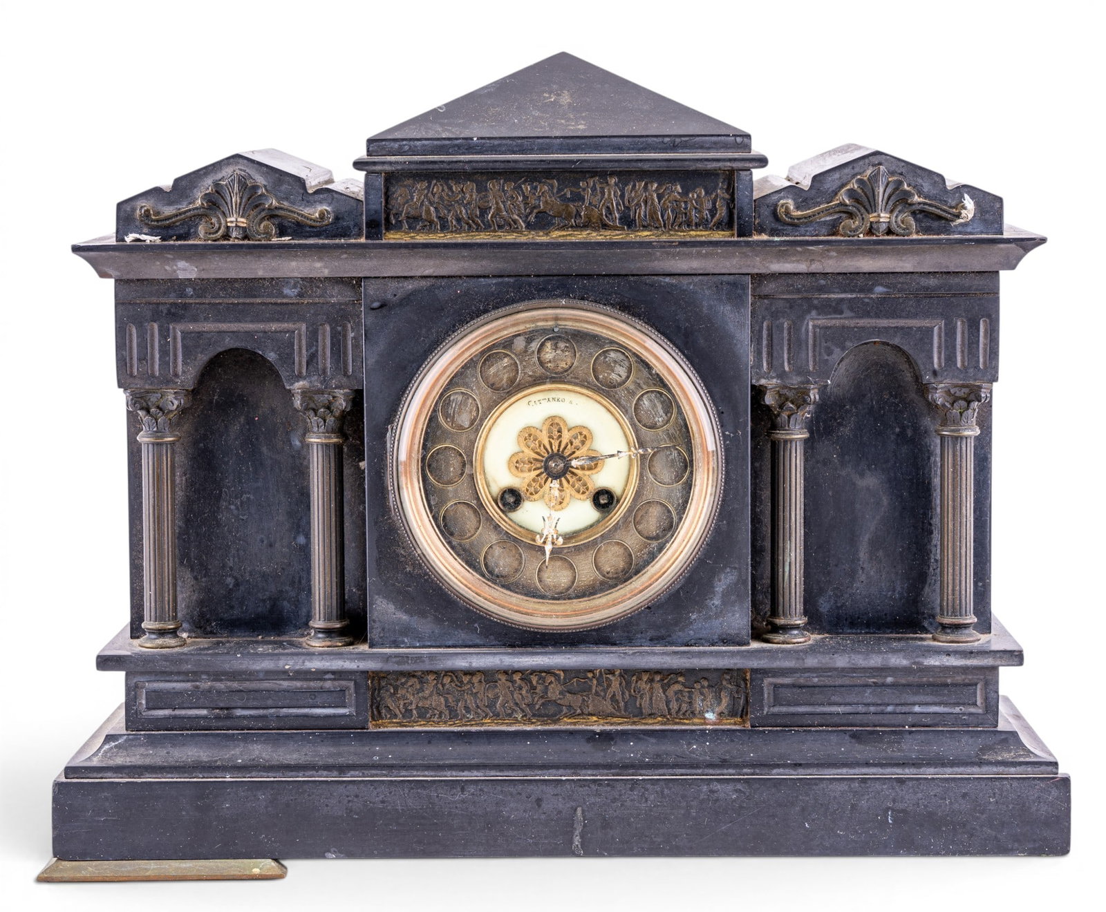 Cattaneo & Co Greek Revival Slate Mantel Clock: Antique Cattaneo & Co mantel clock with slate body in the Greek Revival style. Time and strike movement. One foot currently detached, some loss to back corner near foot. Measures approx. 15" W x