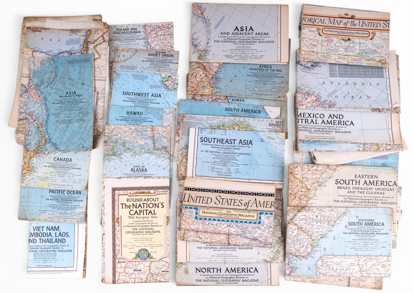 Various National Geographic Maps: Group of loose National Geographic cartographic maps dating from the late 1940s through the 1960s, including examples such as The Top of the World (1949), Asia (1951), Mexico and Central America