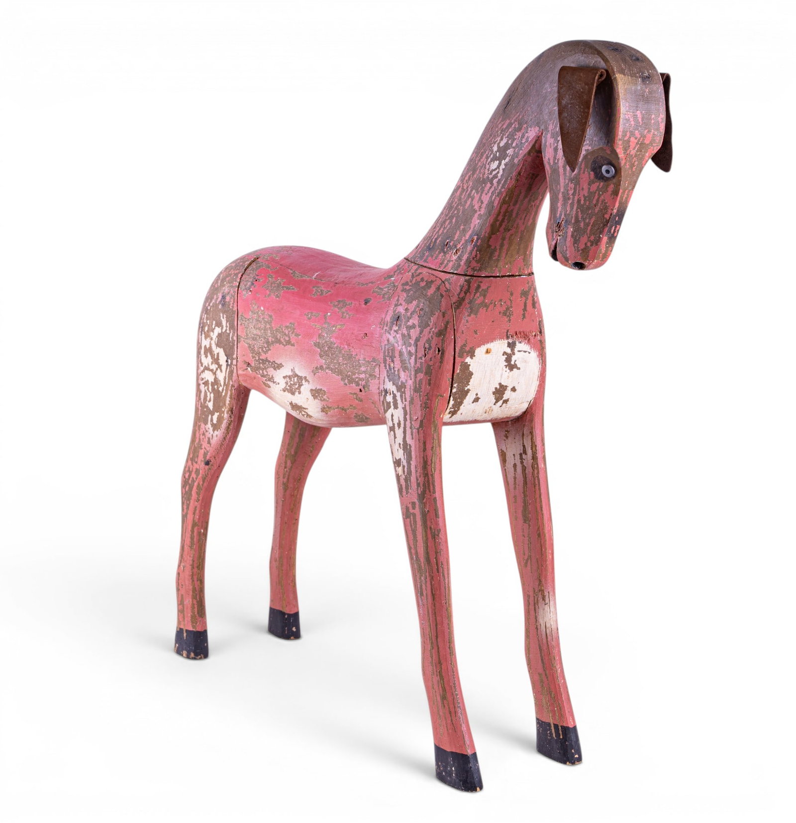 Carved Folk Art Style Goat Statuette: A painted wooden Folk Art style goat statuette with weathered leather ears, marked 'Made in Philippines', measures approx. 26" W x 6" D x 26" H.