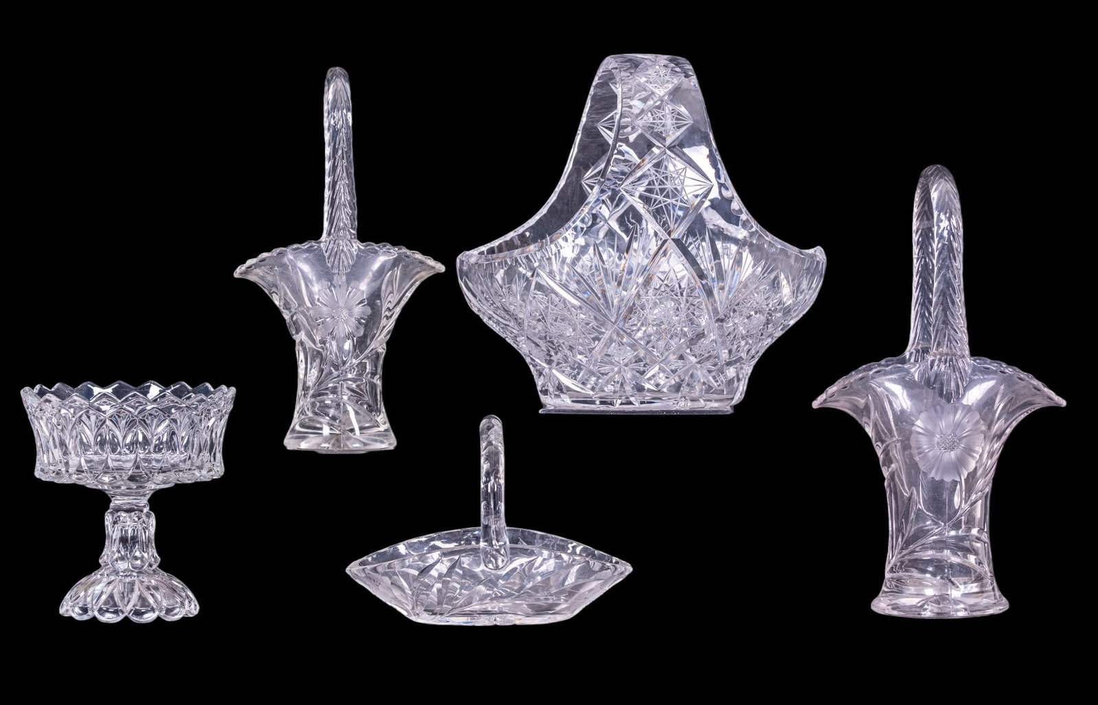 Cut Crystal & Pressed Glass: Collection of decorative glass including a large cut crystal handled basket, a small pressed glass handled basket, 2 pressed glass handled baskets with floral decoration, cut crystal pedestal open