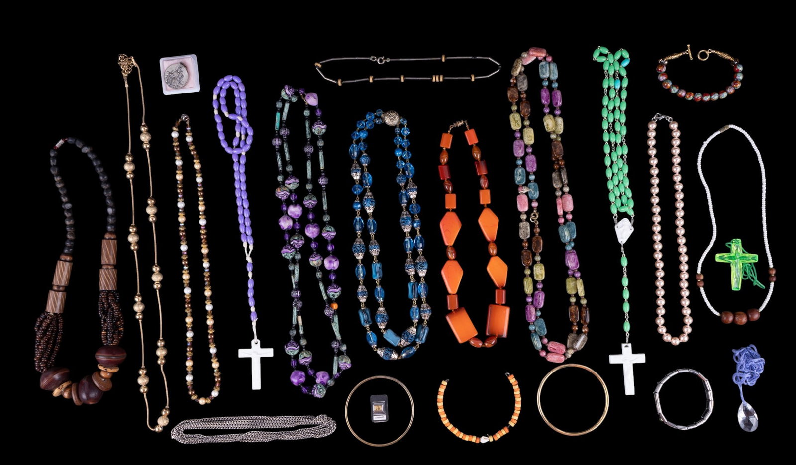 Vintage Beaded and Other Necklaces: A collection of vintage beaded costume necklaces, Rosaries, bangle bracelets, faux pearl, and more. Longest measures approx. 25" on the drop.