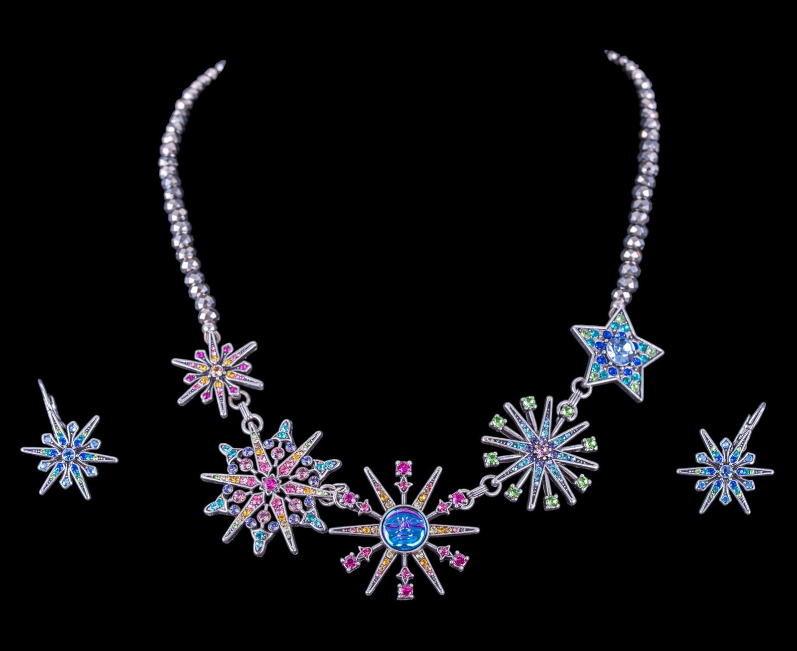 Kirk's Folly Jewelry: Whimiscal Kirks Folly star burst necklace with the face of the moon and matching earrings.