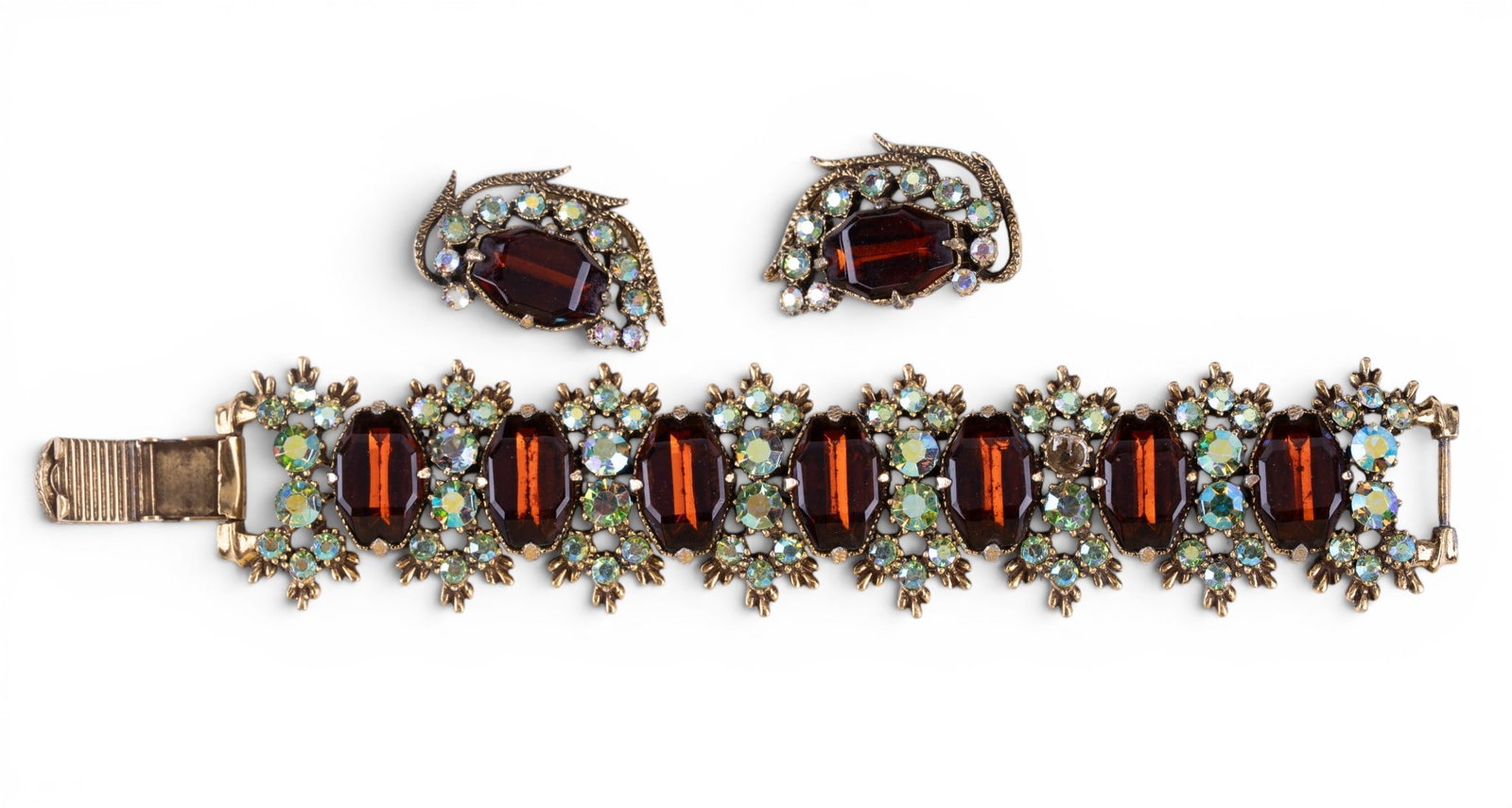 1950's Vintage Bracelet + Earrings: Unsigned vintage red / amber color and clear rhinestone bracelet with matching clip earrings. Very good condition for age.