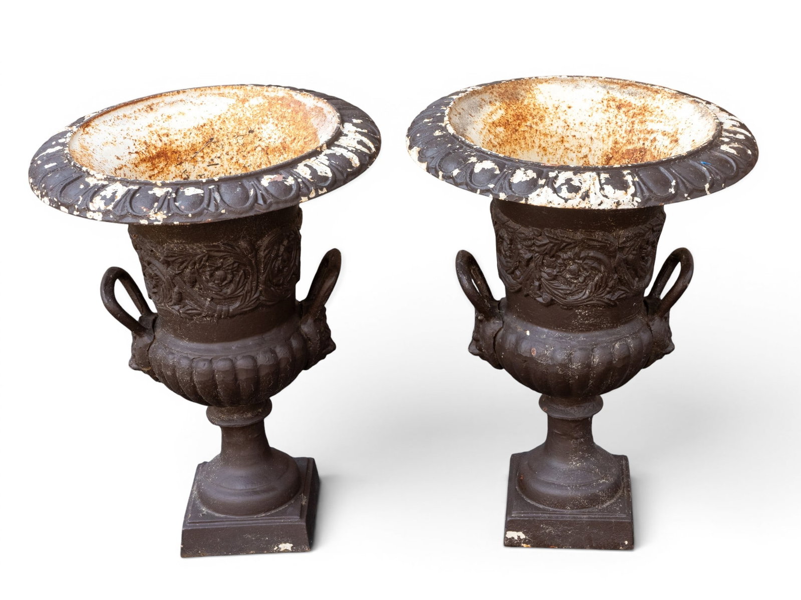 Pair of Cast Iron Handled Urns: Cast Iron decorative urns with handles and black finish. Each measures approx. 24.5" H x 18" Diameter.