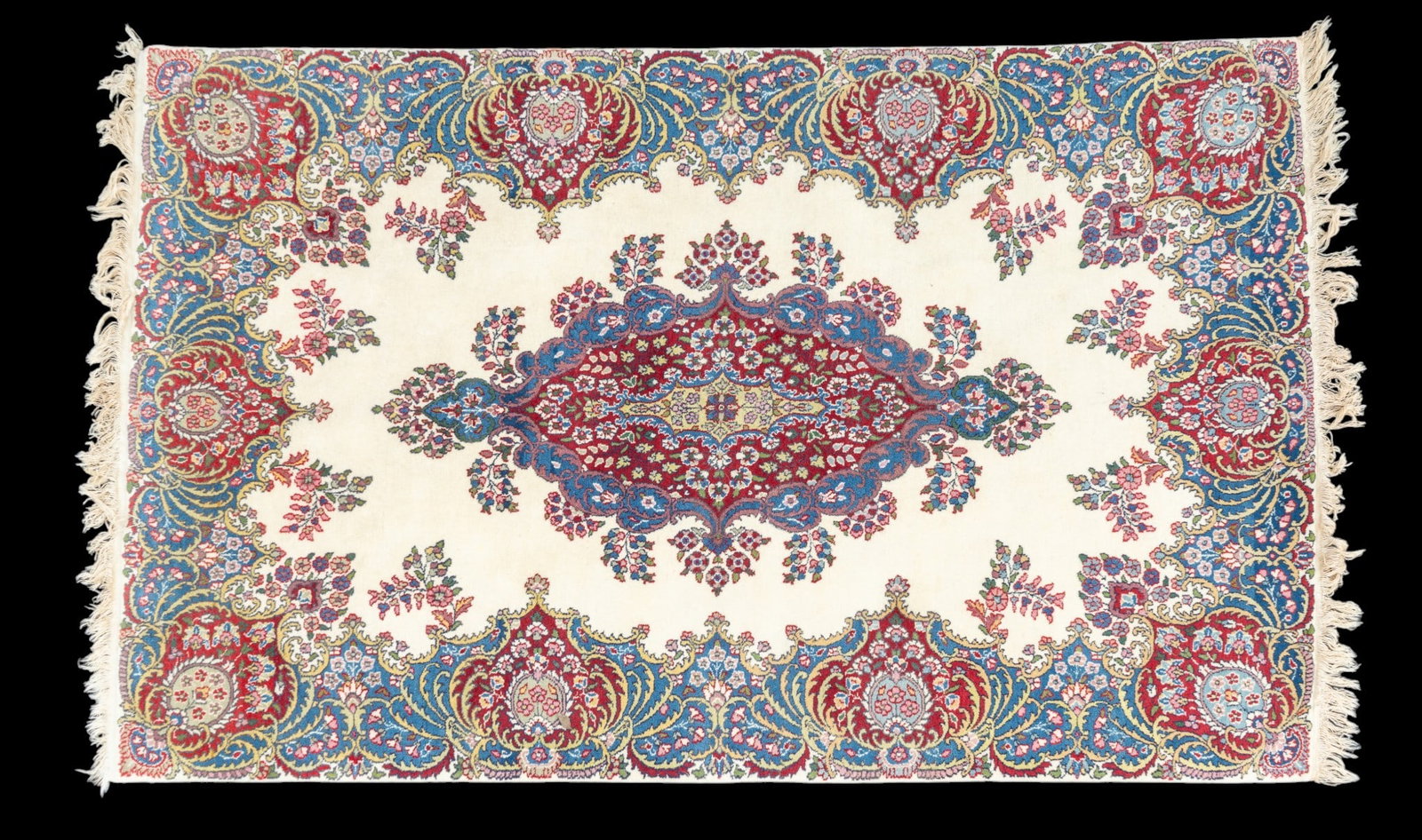 Persian Kirman Area Rug ~4'x6': Persian Kirman area rug with floral pattern in shades of green, red, beige, and blue. Measures approx. 4'1" x 6'3".