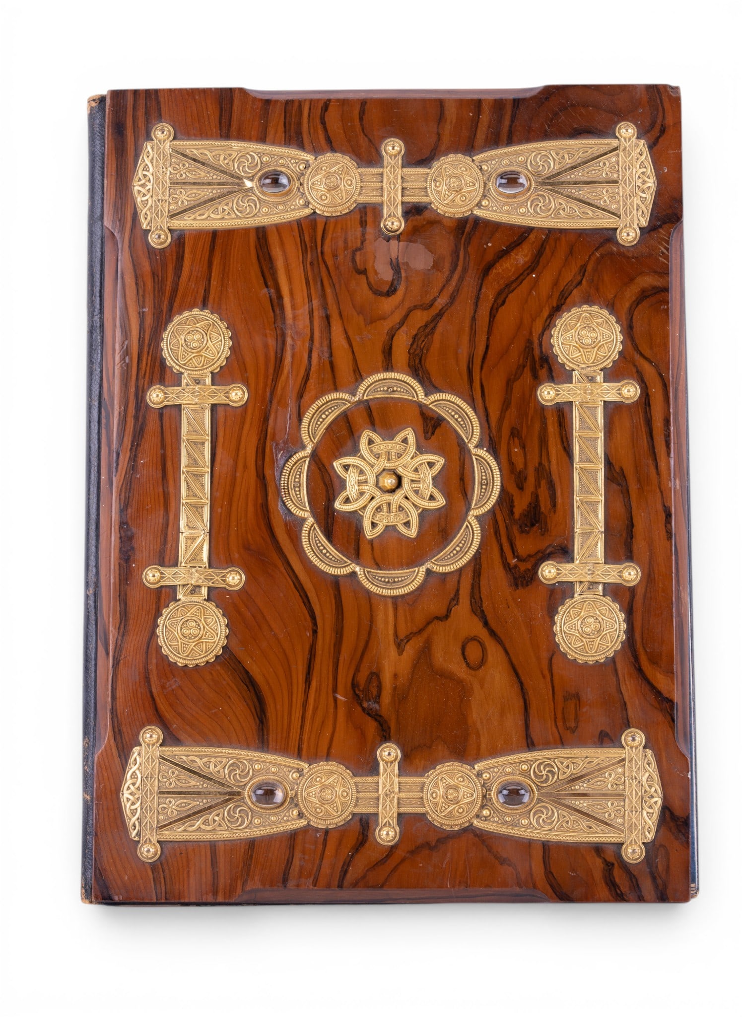 Celtic Revival Irish Bog Yew Wood Covered Blotter: A Celtic Revival era blotter book featuring royal blue satin lining and gold tone Celtic knot applique with crystal oval cabochons on the Irish Bog Yew cover. Note hand painting was used to enhance