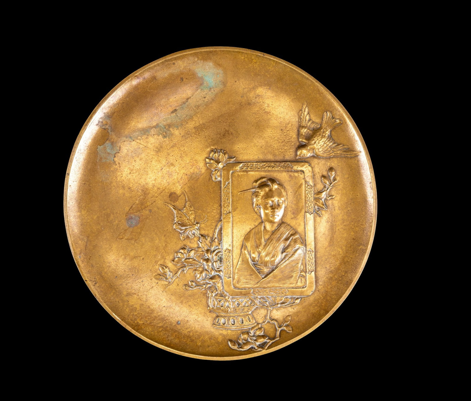 Antique Austrian Bronze Charger, Berndorf B: Decorative Antique Austrian bronze footed charger signed Berndorf B on reverse, depicting an Asian / Oriental woman within a framed cartouche, surrounded by floral branches, butterfly, and bird motifs