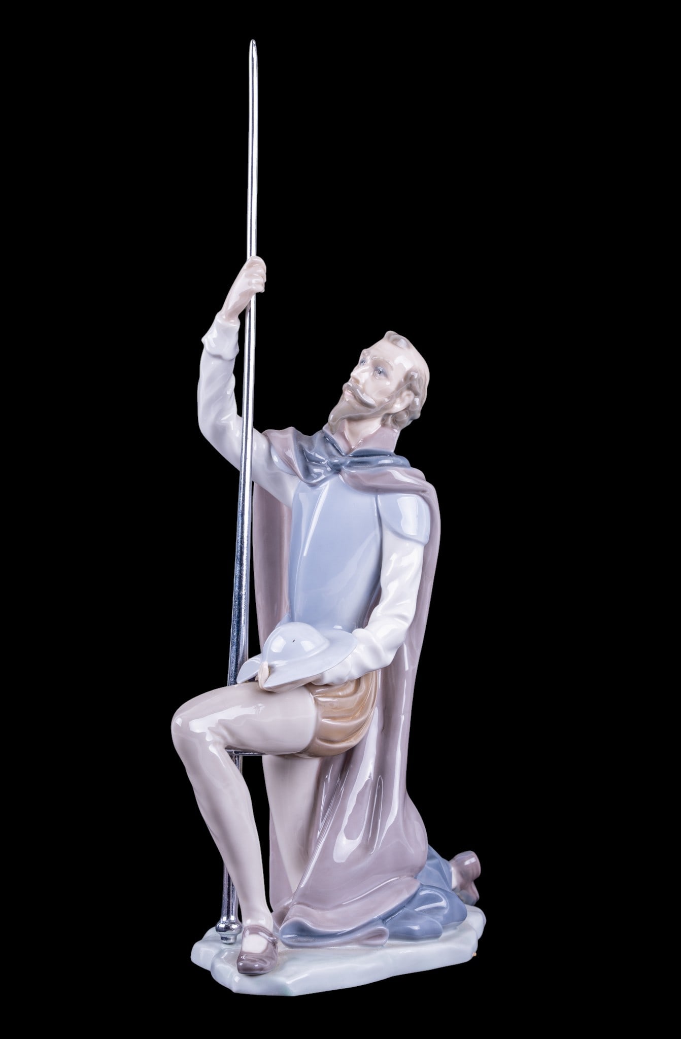 Lladro Don Quixote Porcelain Figurine No. 5224: Lladro porcelain figurine with original box titled Don Quixote Arrodillado No. 5224, includes metal lance. Measures approx. 11" H.