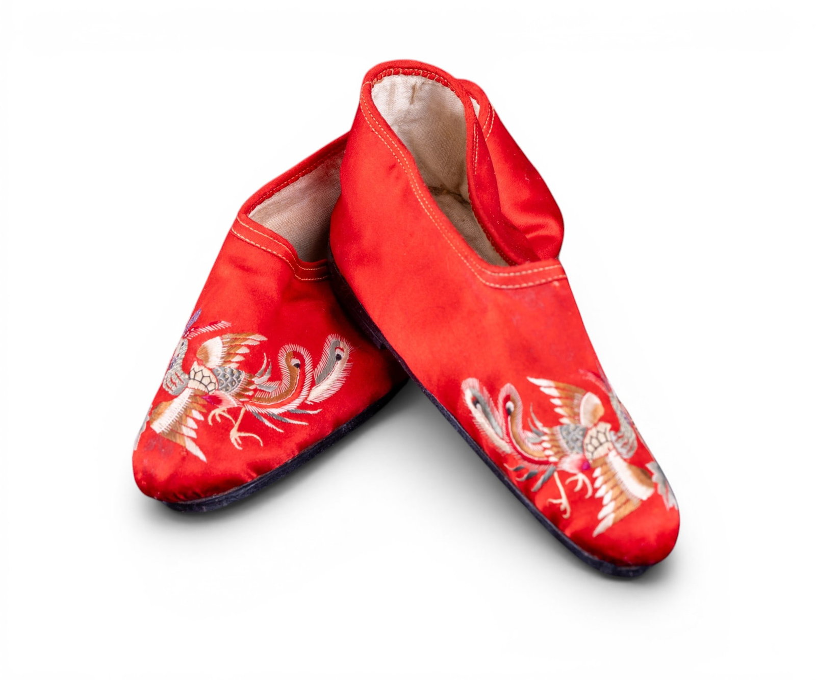 Early 20th C Chinese Wedding Shoes: A pair of embroidered red silk Japanese wedding shoes intended for brides with bound feet, marked on the bottom 'Che Foo 1935' and a maker's mark. May also be called or like a Lotus shoe.