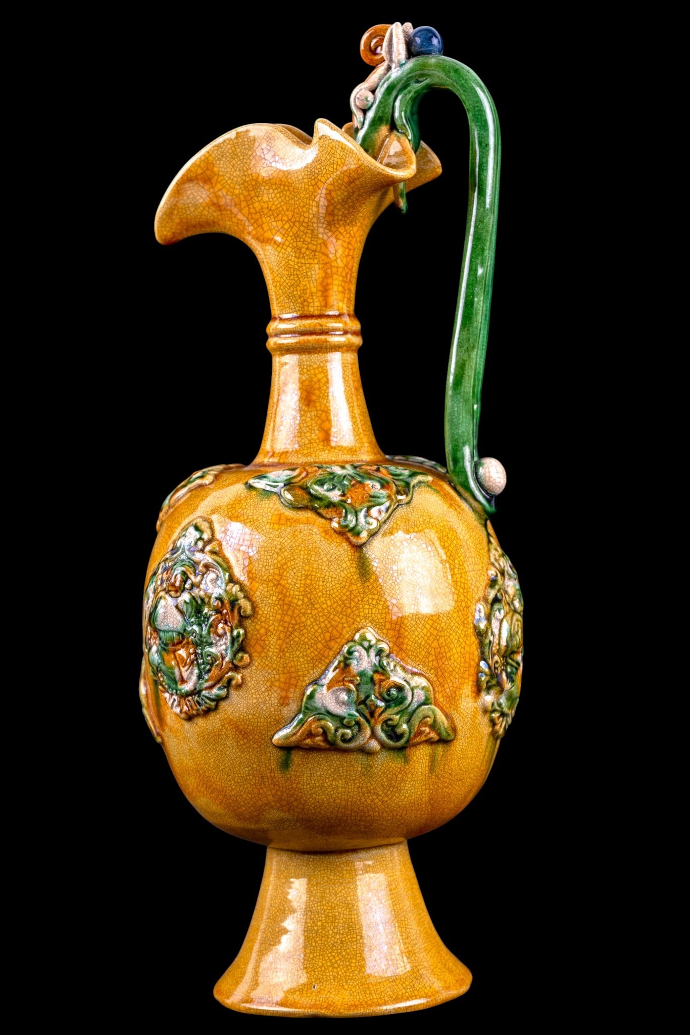 Chinese Glazed Pottery Ewer w/ Fitted Box: Chinese Tang Dynasty style pottery ewer featuring a crackled yellow glaze with applied green and cream relief decoration. Includes fitted presentation box. Measures approx. 12.75" H.