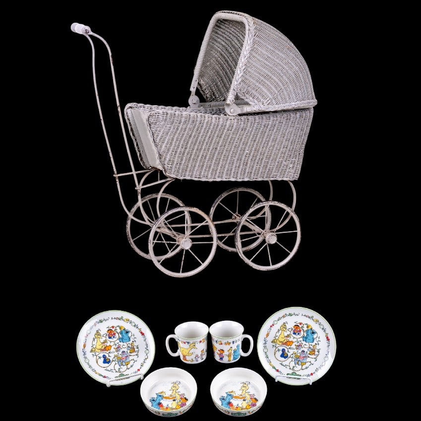 Gorham Sesame Street Lunch Set & Doll Carriage: A double set of Gorham porcelain Sesame Street lunch set including 2 plates, 2 bowls, and 2 cups, and a Heywood-Wakefield painted wicker baby carriage featuring a metal bottom and frame and label. Car
