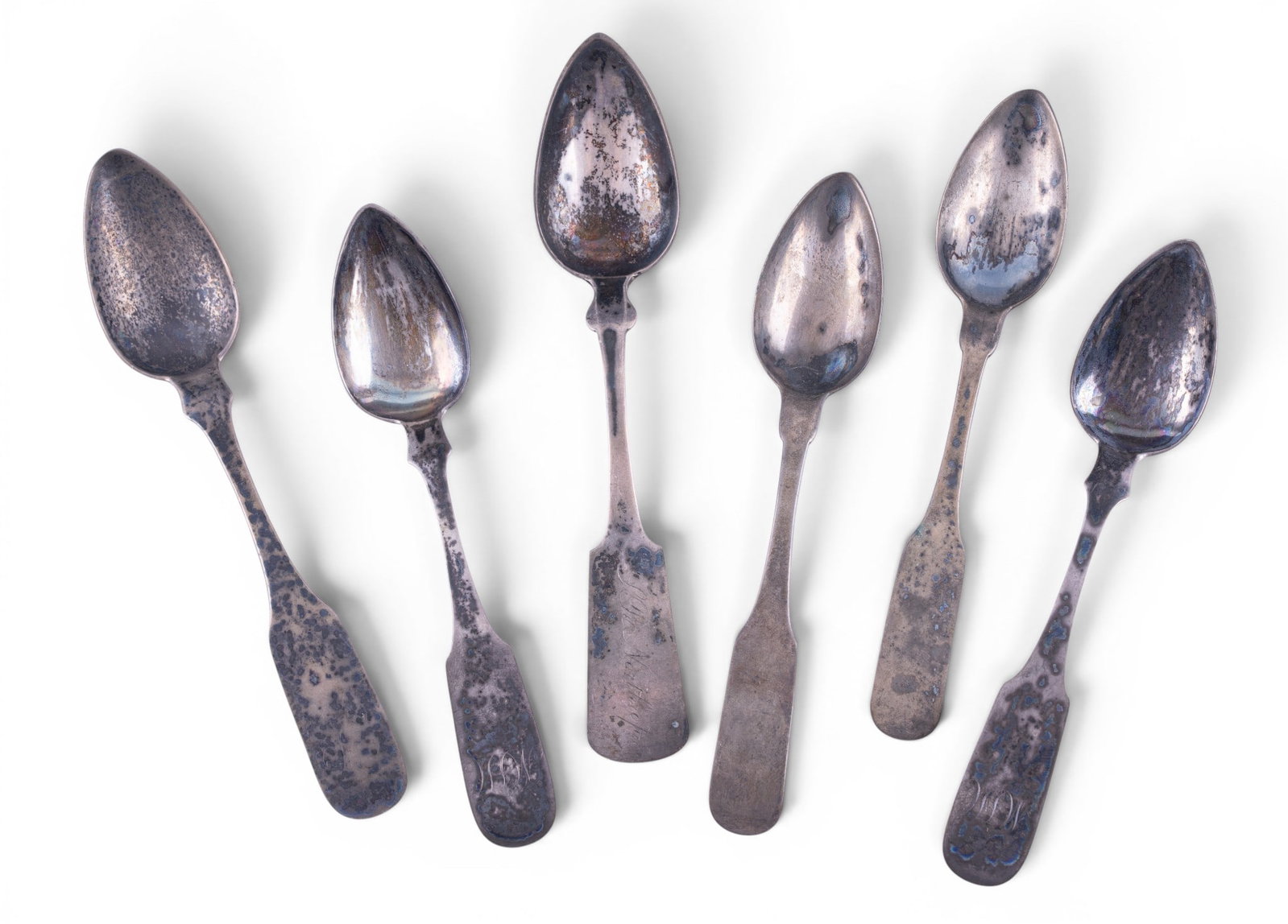 Six Early American Coin Silver Spoons: Collection of six early American coin silver spoons dating to the 19th century. Includes examples by makers E. Borhek (2), C.A. Burr, G.W. Taylor, and B. Cleveland (2).