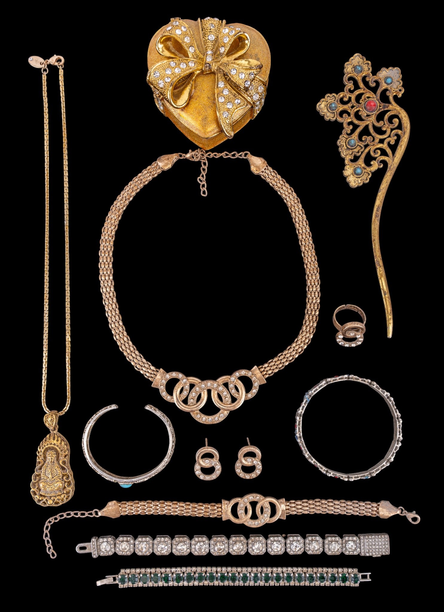 Chinese Gold Tone Costume Jewelry: A collection of Chinese gold tone costume jewelry including pendants, bracelets, earrings, a hair stick, and enamel jewelry box, featuring facet cut rhinestones, stone cabochons, and enamel inlay.